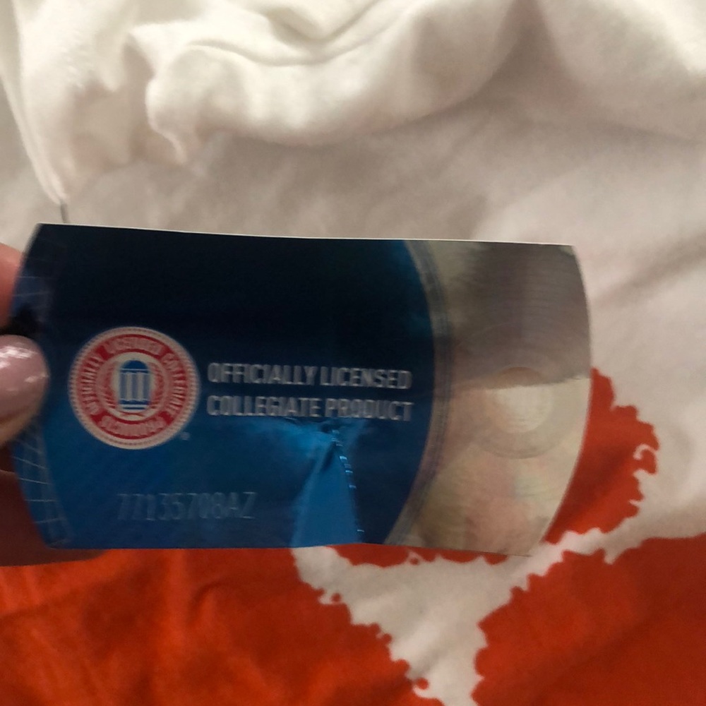 NWT Nike  women’s SzS Orange/White T-shirt w/Paw - Picture 3 of 6